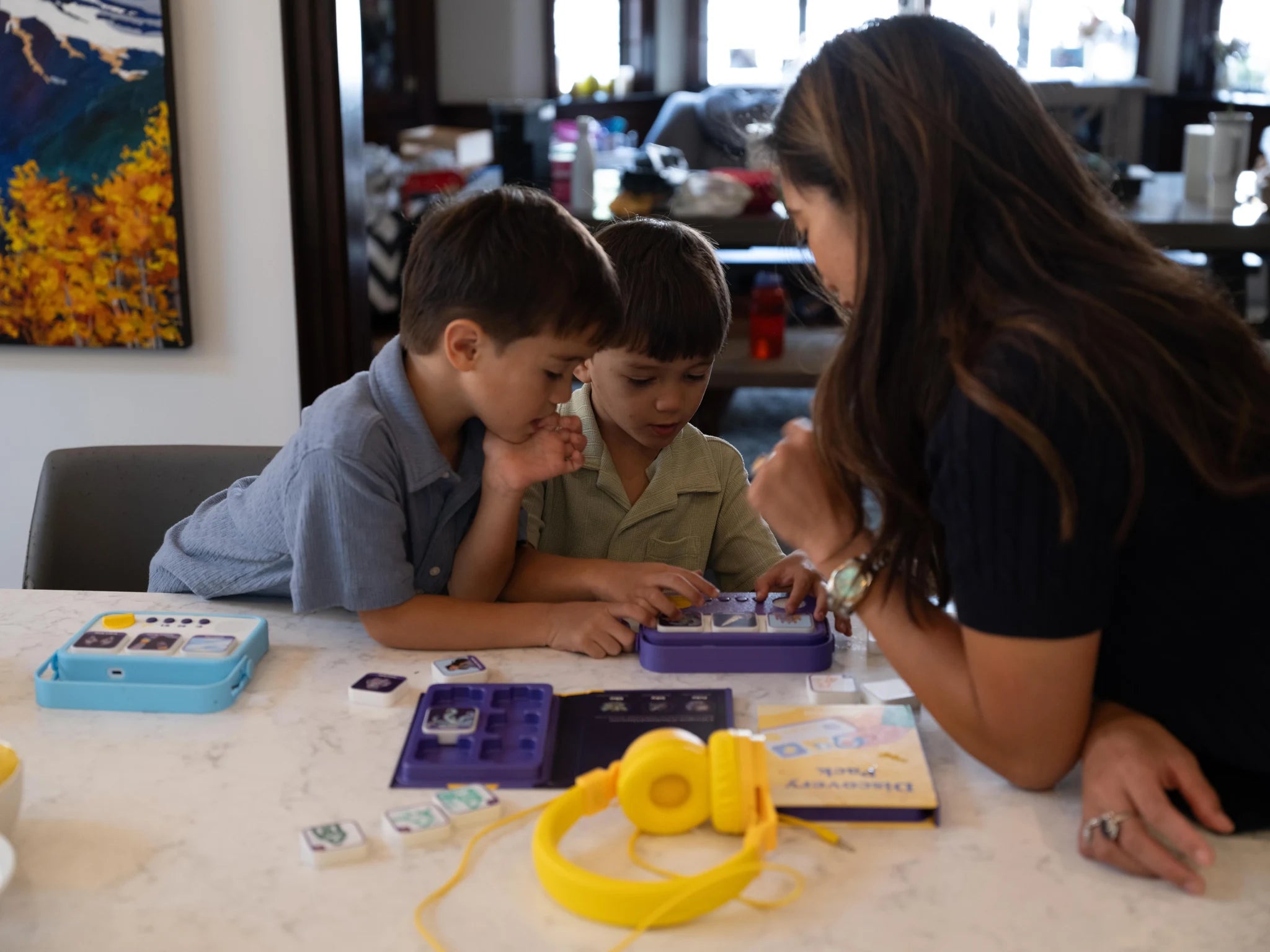 Children creating a story together at a table