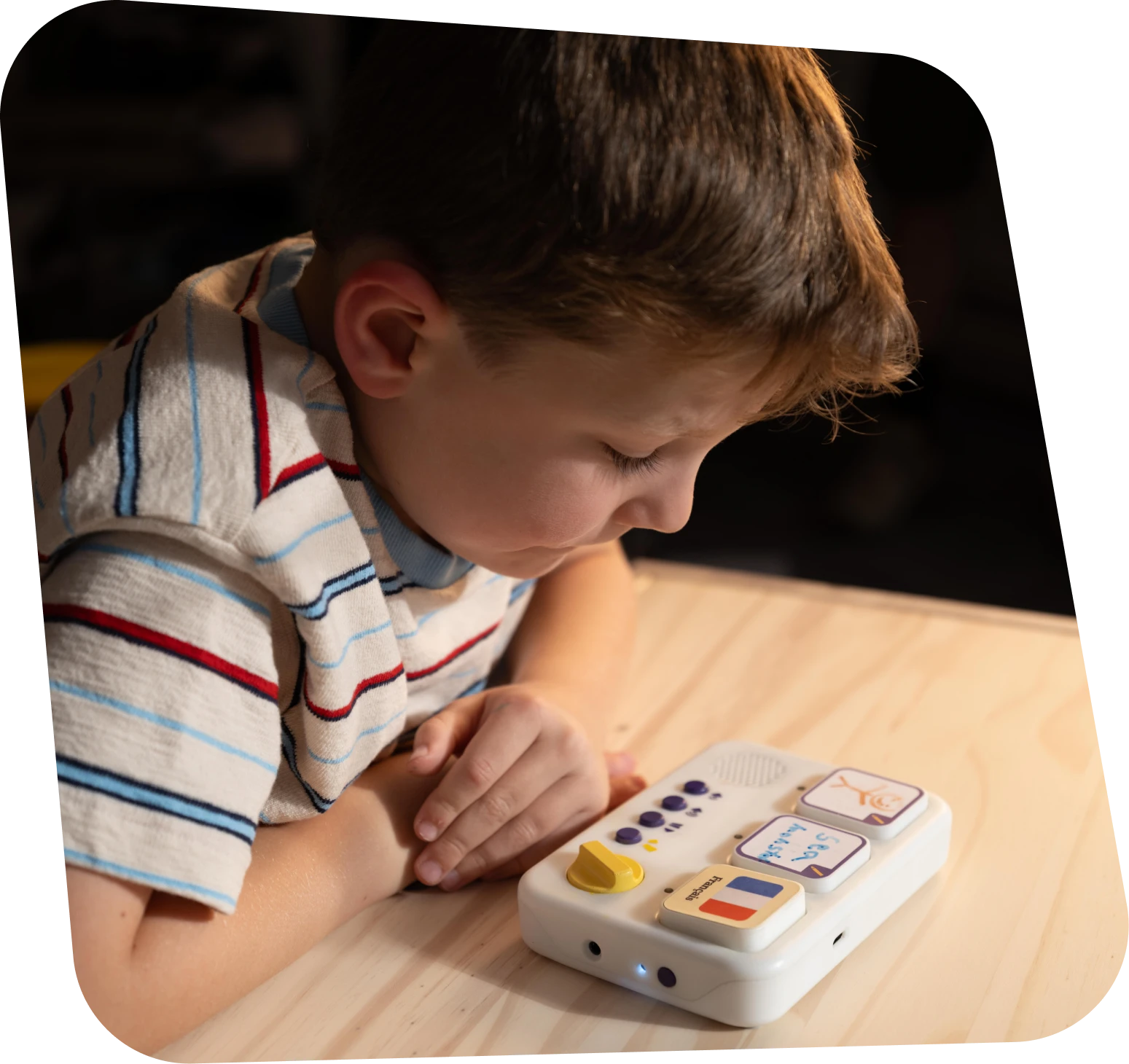 A child playing with their storymaker.